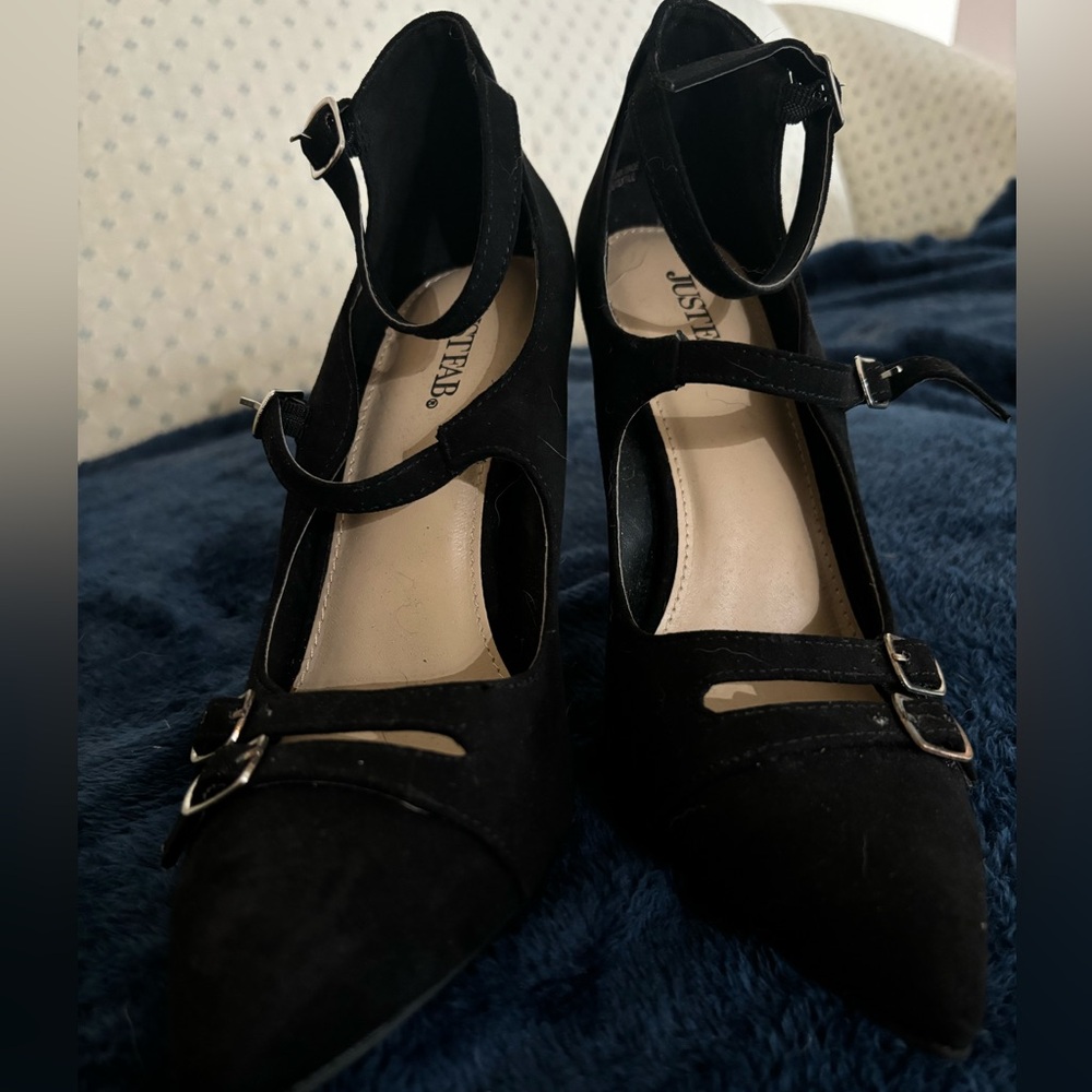 Black pumps with buckles